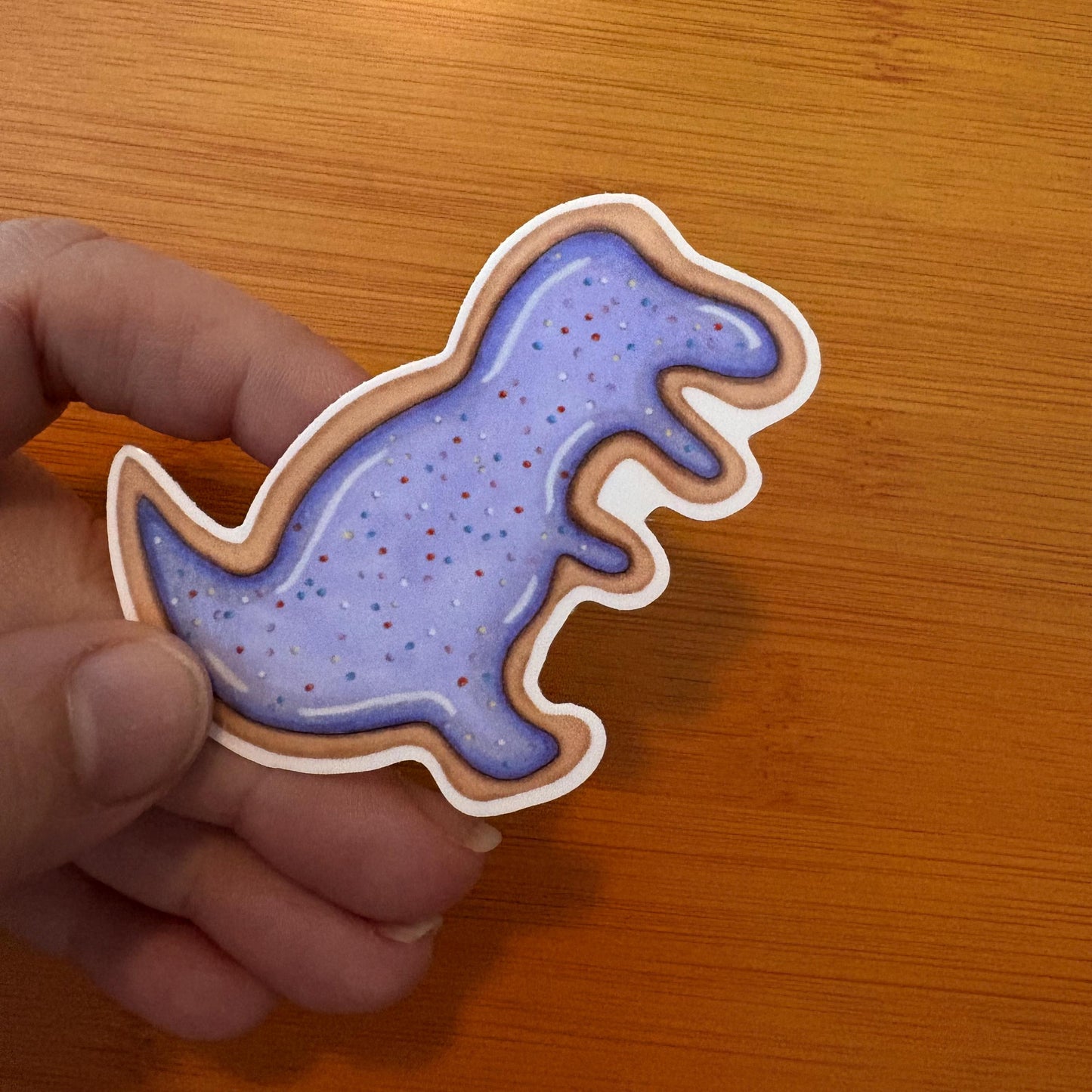 T-Rex iced animal cookie 2.5” glossy vinyl laptop water bottle sticker decal