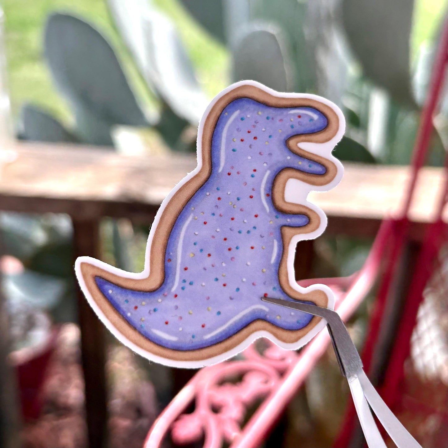 T-Rex iced animal cookie 2.5” glossy vinyl laptop water bottle sticker decal