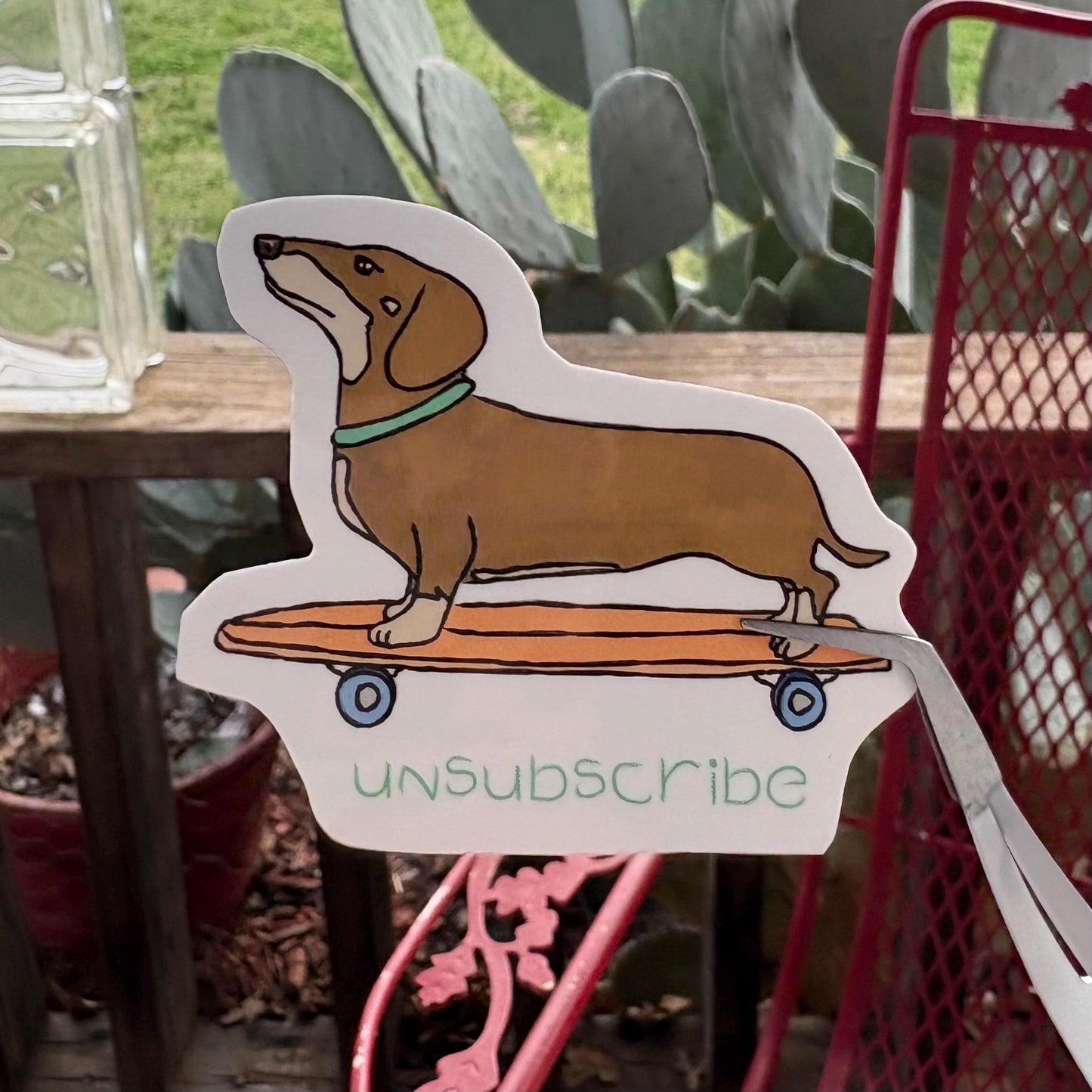 Weenie dog on a skateboard “adios muchachos” durable glossy vinyl laptop water bottle decal